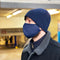 Man wearing blue Maskari face mask
