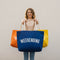 “weekending” beach tote in Royal Blue, large shoulder carryall lady holding multiple colours