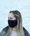 Woman wearing a black Maskari face mask in public